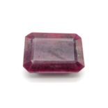 A 241ct Rectangular Step-Cut Ruby Gemstone. Crystalline inclusions and Colour enhanced. GLI