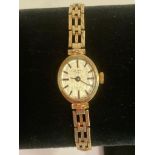 Ladies vintage 9 carat GOLD ROTARY WRISTWATCH with hallmarked 9 carat GOLD GATE BRACELET. Manual