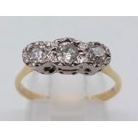 A VINTAGE 18K GOLD RING IN LOVELY CONDITION WITH 3 QUALITY DIAMONDS SET IN PLATINIUM . 2.82gms