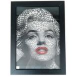A framed, 3D portrait of Merilyn Monroe. Acrylic print with 3D effects. This unique method was