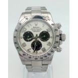 A ROLEX DAYTONA- OYSTER PERPETUAL SUPERLATIVE CHRONOMETER COSMOGRAPH IN STAINLESS STEEL WITH 3