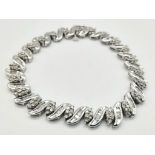 A 14 K white gold bracelet with diamonds (2.50 carats). Length: 18 cm, weight: 15.3 g.
