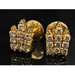 An 18 K yellow gold set of stud earrings with diamonds (1 .0 carats). Total weight: 6.9 g. NB: