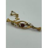 Antique Victorian/Edwardian, 9 carat GOLD ,GARNET and PEARL BROOCH. Gold safety chain attached.2