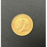 A 1912 George V 22K Gold Full Sovereign. 8g. Please see photos for conditions.