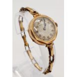 An Antique 9K Rose Gold Watchers Ltd Ladies Watch. 9K gold expandable bracelet. 9K hallmarked case -