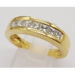 An 18 K yellow gold ring with seven quality, princes cut diamonds (0.60 carats). Ring size: N,