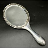 An Antique Silver Hand Mirror. Hallmarks for London 1912. Makers mark of Samuel Jacob. 28cm. 314g