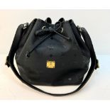 A MCM Black Leather Bucket Monogram Canvas Shoulder Bag. Leather draw string top. Gold tone