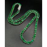 A 925 Silver and Emerald Tennis Necklace. Total Weight 32grams. 46cm in length.