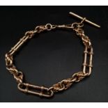 An Antique 9K Rose Gold T-Bar Albert Chain. Elongated and circle-twist links. 38.73g. 25cm