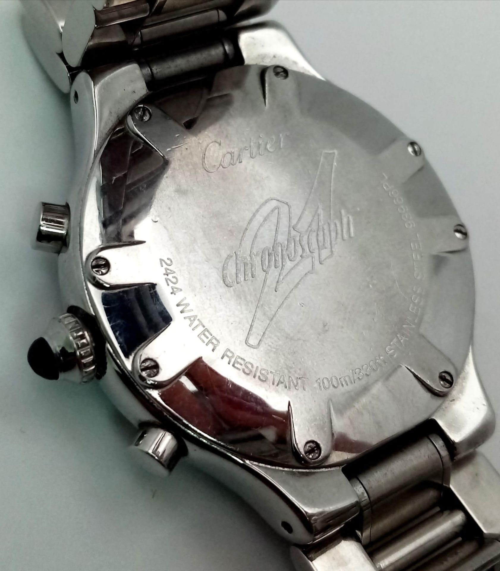 A Cartier 21 Chronograph Watch. Stainless steel strap and case - 38mm. Black monogram dial with - Image 8 of 8