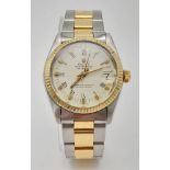 A bimetal ROLEX OYSTER PERPETUAL DATEJUST watch. Stainless steel case 31 mm, 18 K yellow gold