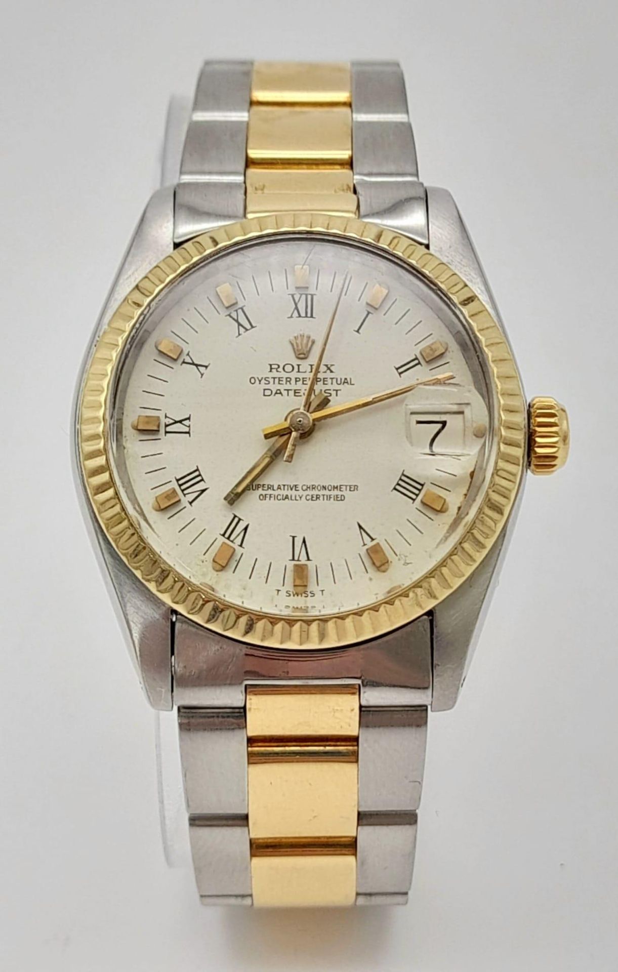 A bimetal ROLEX OYSTER PERPETUAL DATEJUST watch. Stainless steel case 31 mm, 18 K yellow gold