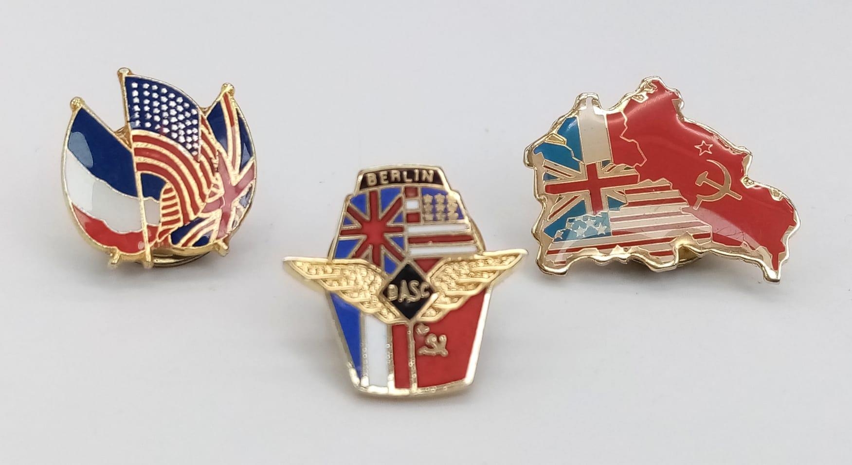 Three Miniature BASC (Berlin Air Safety Centre) Metal and Enamel Badges. In good condition.