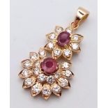 18K YELLOW GOLD DIAMOND & RUBY DROP PENDANT 1CT APPROX DIAMONDS 0.70CT APPROX RUBIES. TOTAL WEIGHT