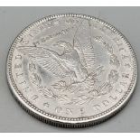 An 1898 Morgan Silver Dollar Philadelphia Mint. Very fine to extremely fine condition, 26.82g.