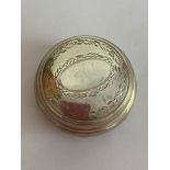 Vintage SILVER PILL BOX in circular form, having laurel engraving to lid with blank cartouche.