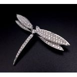 A Wonderfully Crafted 18K White Gold Dragonfly Brooch. Approximately 3.5ct of diamonds. 5.5cm