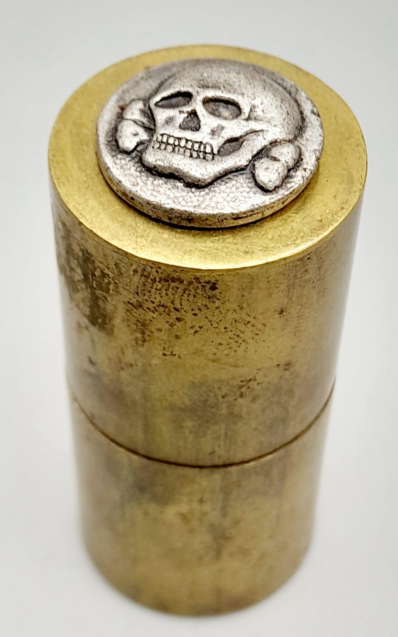 WW2 German Petrol Lighter with a Waffen SS Death Head Button on the top. No International Shipping