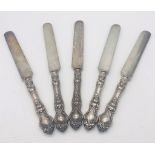 5 VICTORIAN ORNATE SILVER HANDLED KNIVES . 392 25gms