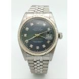 A stainless steel ROLEX OYSTER PERPETUAL DATEJUST watch. Case 36 mm, calibrated bezel, unusual