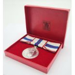 A Queen Elizabeth the Second’s Silver Jubilee Medal 1977, mounted on a ribbon bow for wear by a