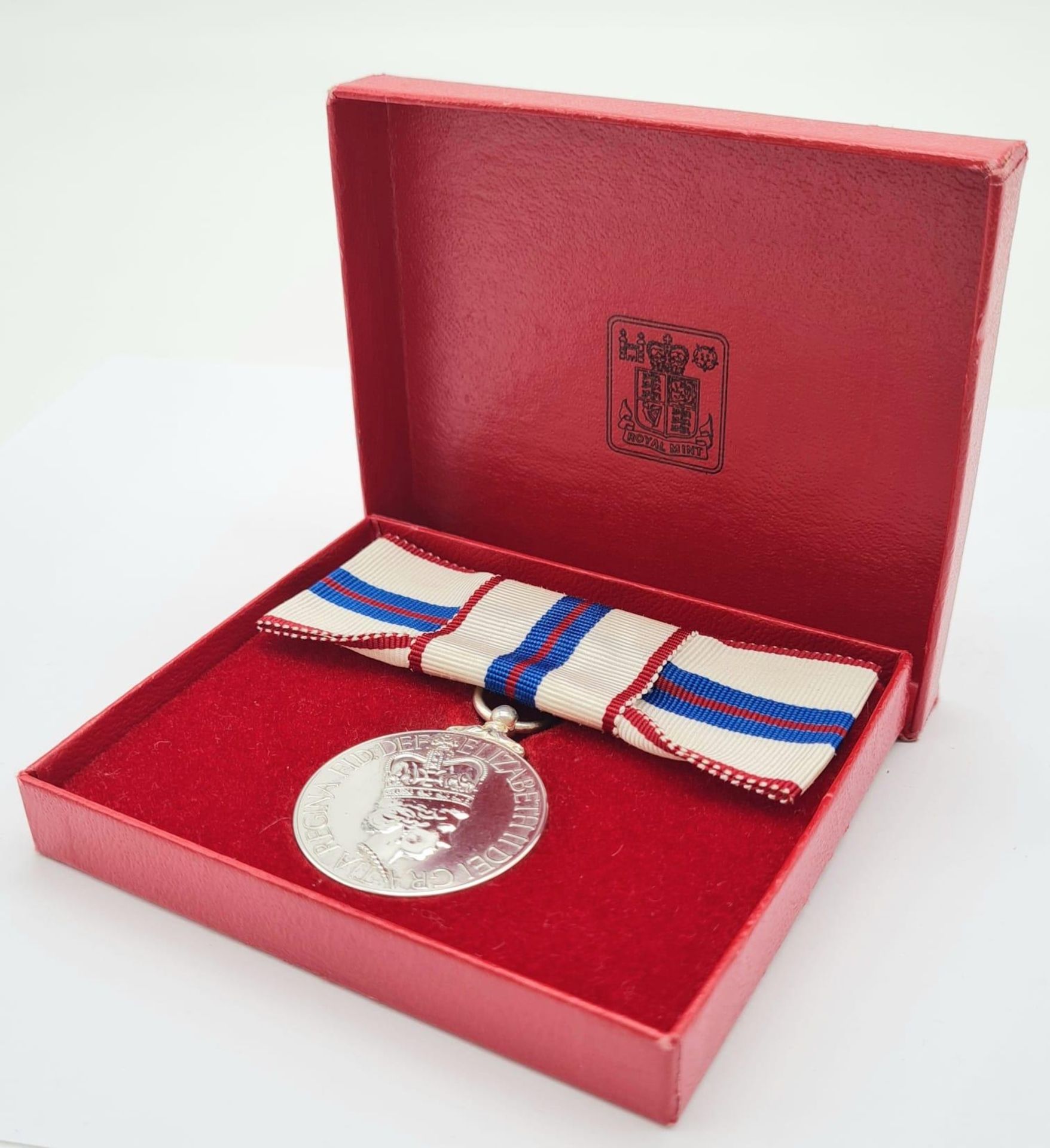 A Queen Elizabeth the Second’s Silver Jubilee Medal 1977, mounted on a ribbon bow for wear by a