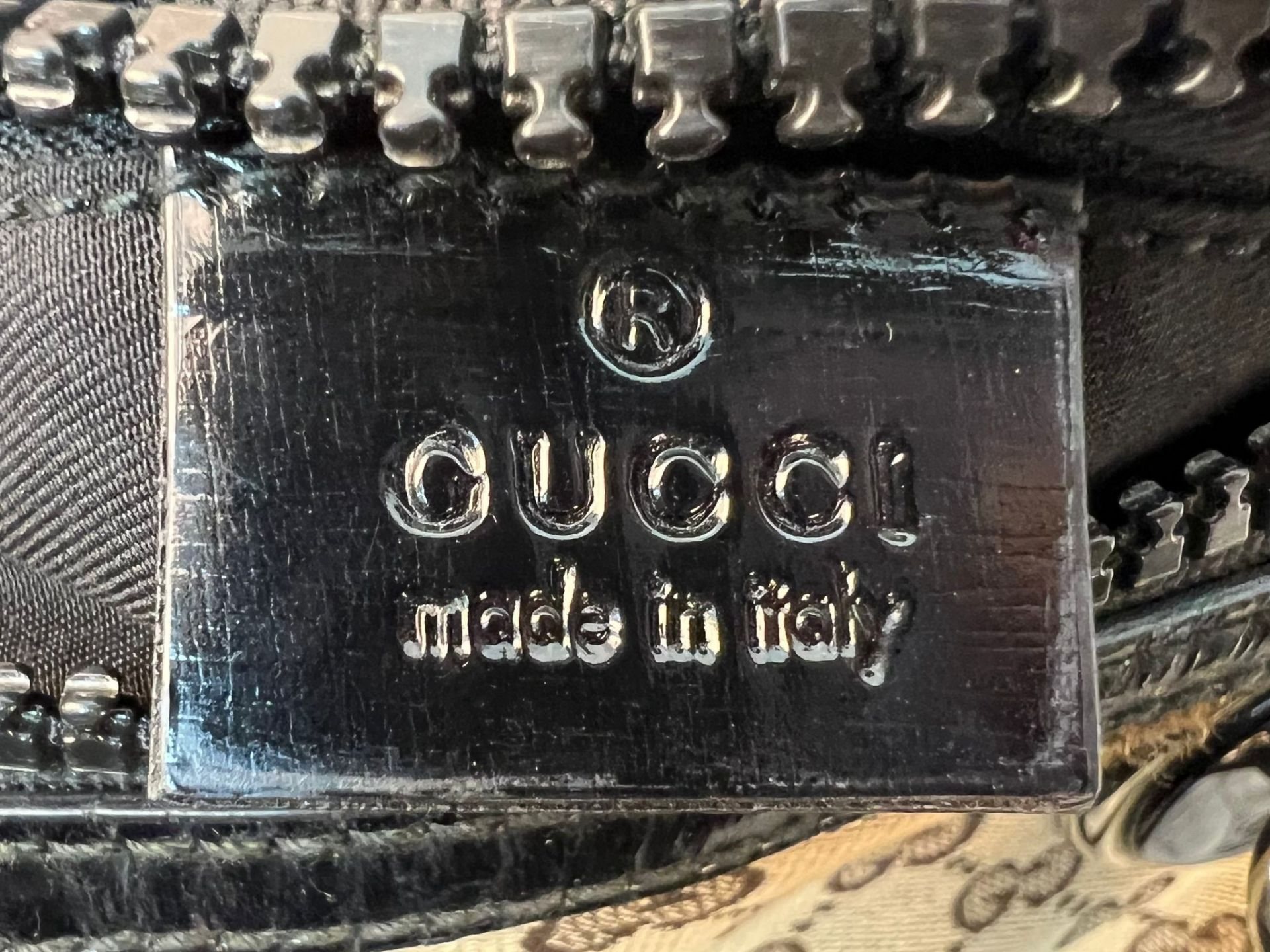 A Gucci Abbey Handbag. Monogram beige cotton exterior with black leather trim. Gucci logo black disc - Image 4 of 7