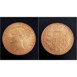 An 1869 Queen Victoria 22K Full Gold Sovereign Coin. Bun head. Please see photos for conditions.