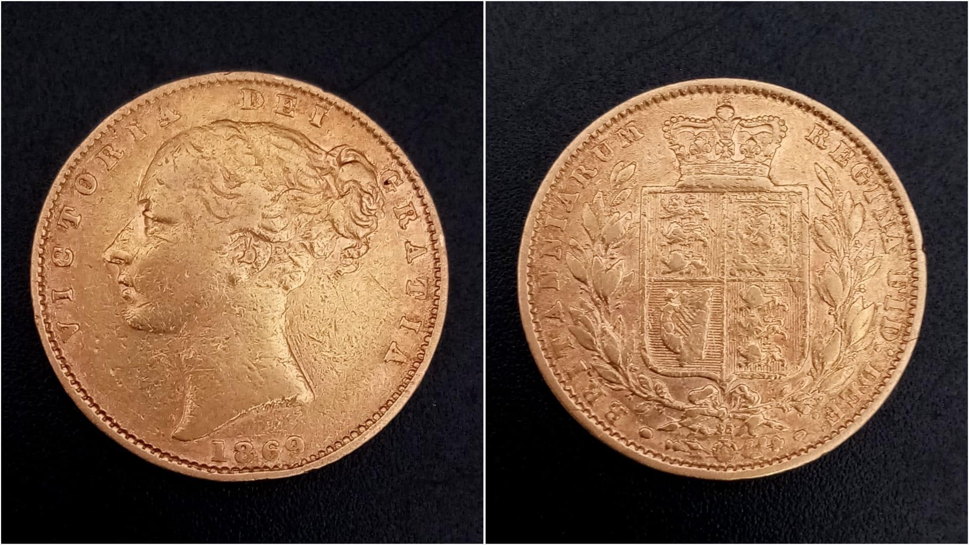 An 1869 Queen Victoria 22K Full Gold Sovereign Coin. Bun head. Please see photos for conditions.