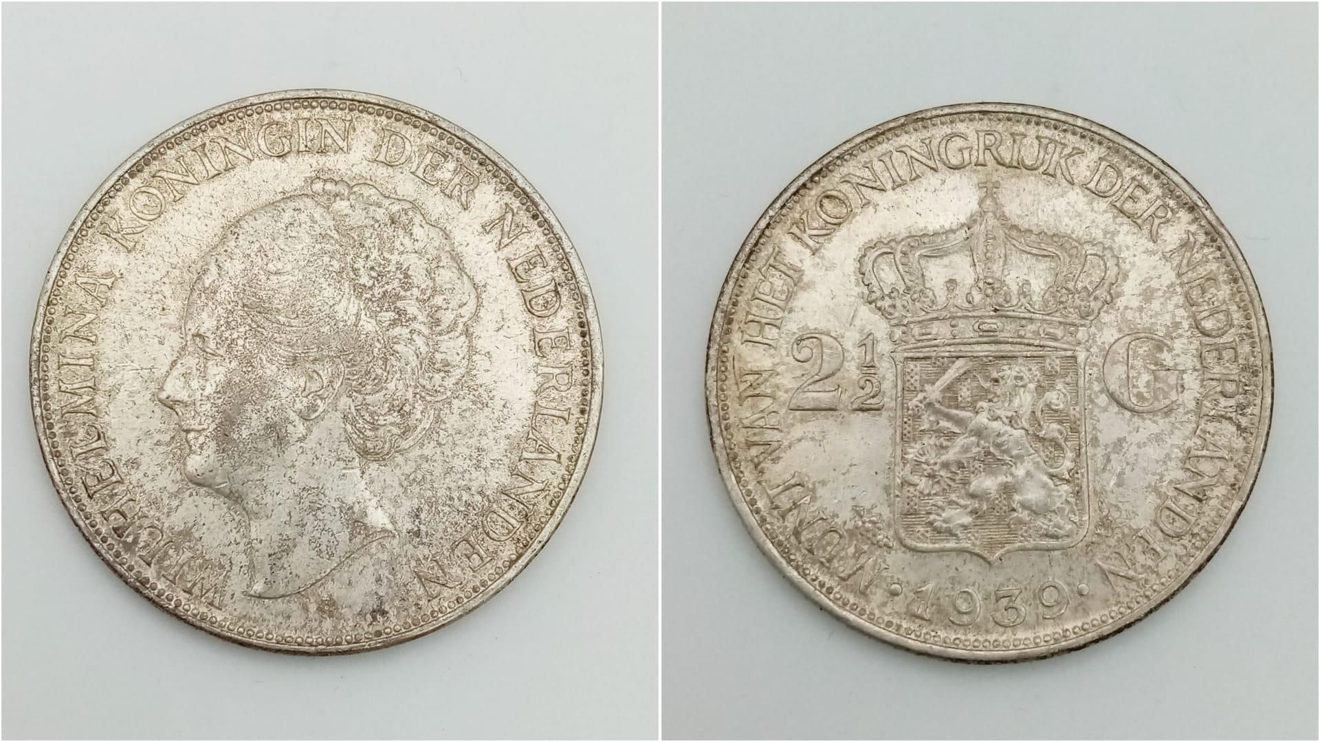 A 1939 Netherlands Silver 2 1/2 Gulden Coin.