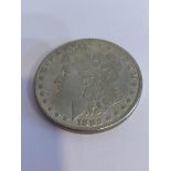 Please note: This US Silver Morgan dollar has markings for 1882 Carson City and is the correct