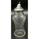 An Antique Sterling Silver and Crystal Glass Sugar Shaker. London hallmarks. Dispenser bent at top