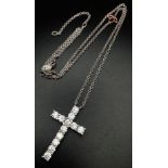 A Browns Designer Diamond Cross Pendant on an 18K White Gold Necklace. 4.5ctw of quality white Si1