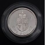 A 1988 ONE POUND COIN IN CAPSULE . 10gms 2.2cms diameter.