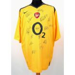 An Arsenal Football Club Signed 2006 Away O2 Yellow Shirt. Fifteen signatures including: Van Persie,