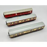 Three Vintage Hornby Dublo Model Train Cars. Two restaurant (21cm) and one guard car (24cm). In good