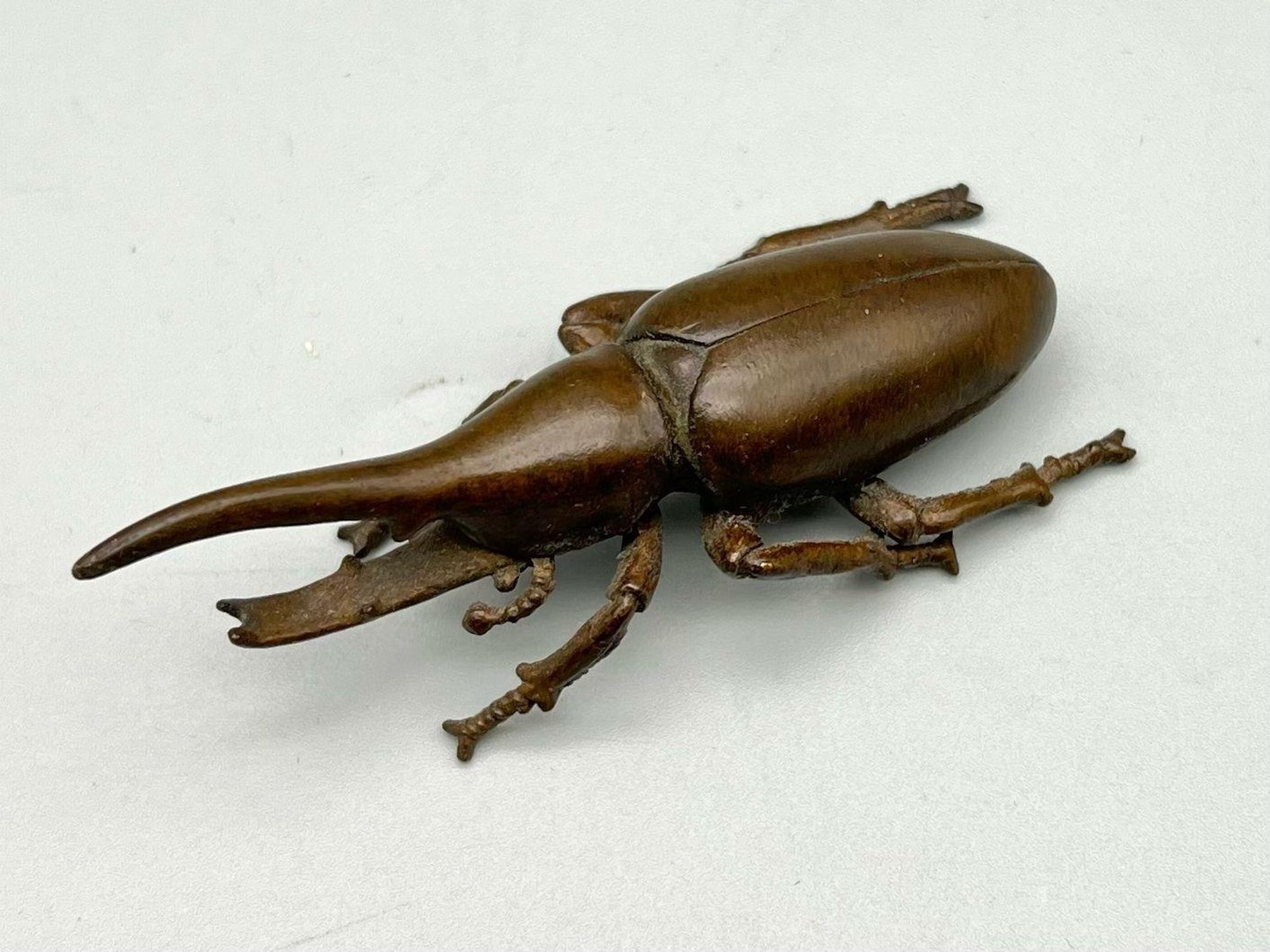 A Vintage Bronze Stag Beetle. 8cm length.