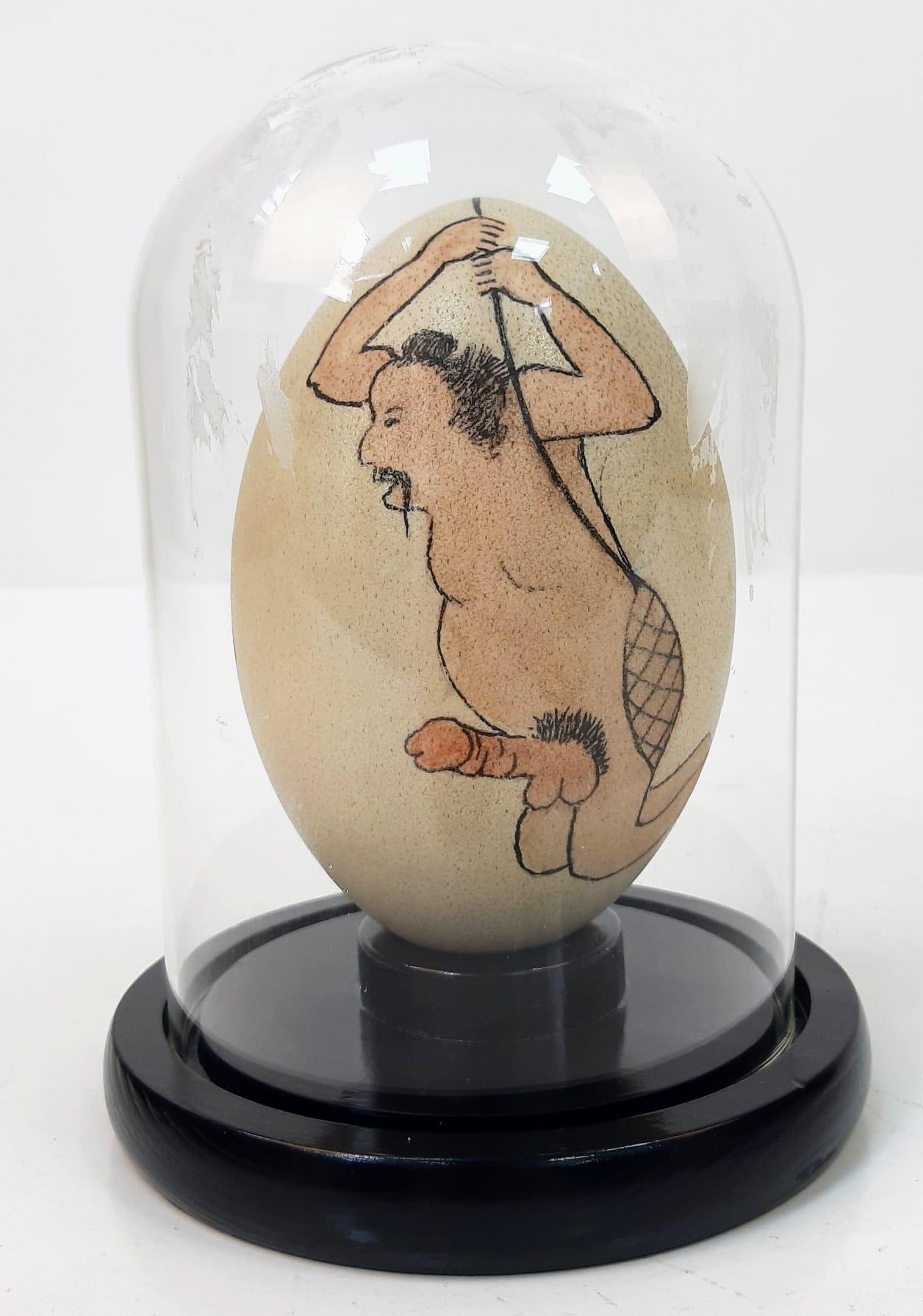 A Japanese, hand painted, ostrich egg, depicting a humorous (and acrobatic) erotic scene after the