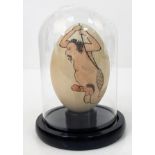 A Japanese, hand painted, ostrich egg, depicting a humorous (and acrobatic) erotic scene after the