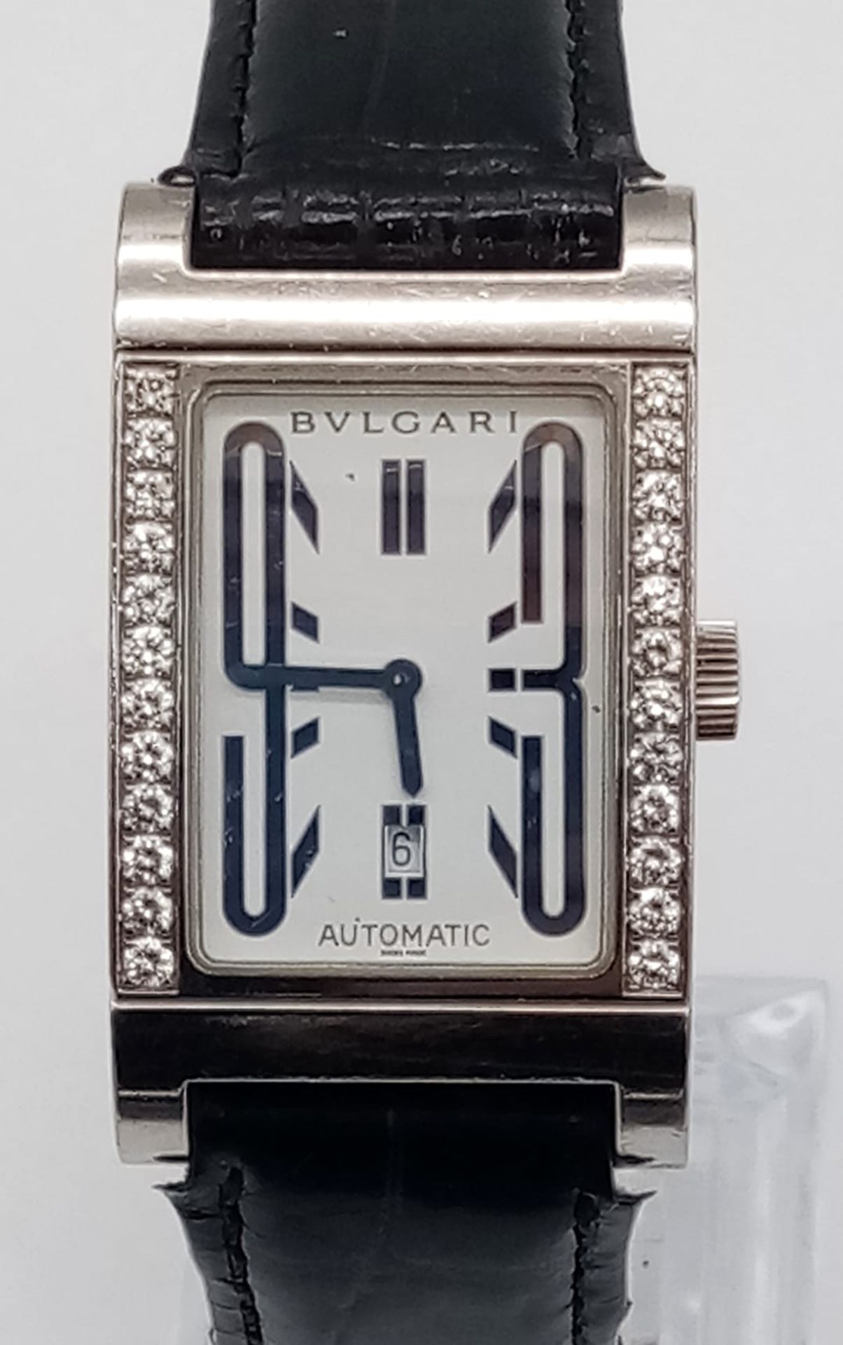 A Bulgari Rettangolo 18K White Gold and Diamond Dress Watch. Black Leather strap. 18K Gold tank case