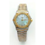 An Ebel Ladies Wave Mother of Pearl Quartz Watch. Two-tone bracelet (24k gold electroplated waves)