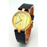 A Cartier Must De Vermeil Tri Colour Unisex Watch. Black leather strap. Vermeil case - 32mm, with