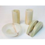 A Selection of Green Onyx Items: Two candle holders -10cm, letter-rack - 12cm and a small bowl -