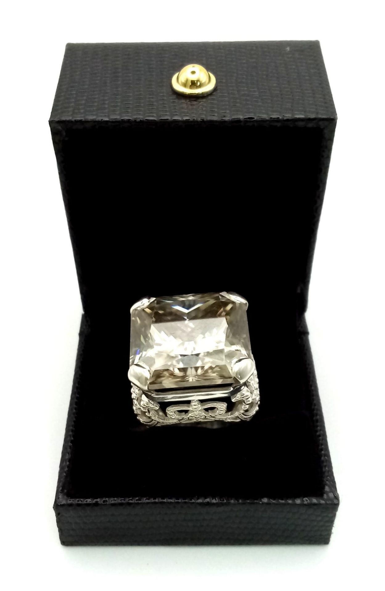 A Rare 79.4ct Brandy Shade Moissanite Ring set in 925 Silver. Size S. 31g total weight. - Image 6 of 6