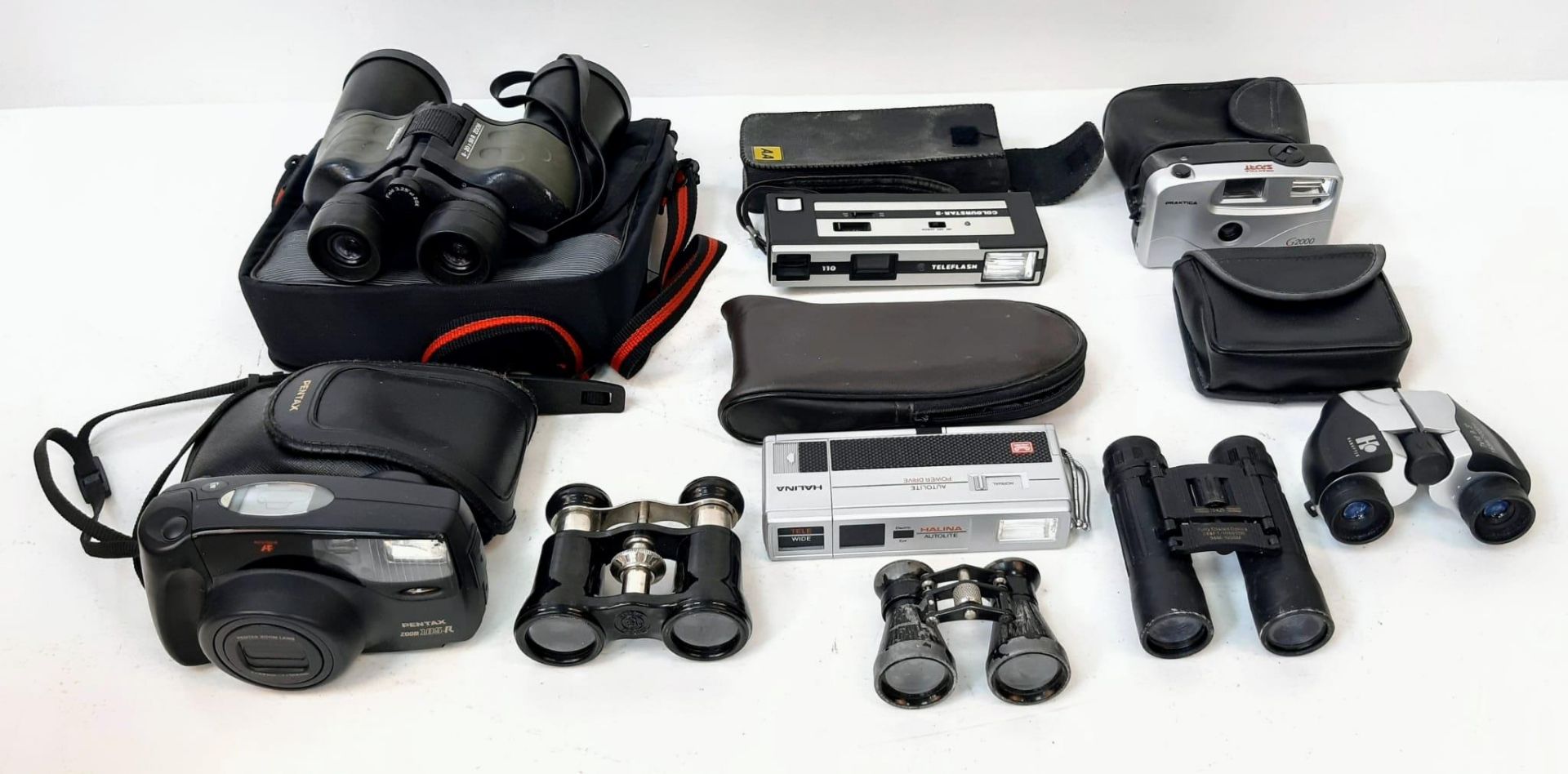 Five Vintage Pairs of Binoculars and Four Vintage Cameras.
