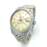 A Rolex Oyster Perpetual Datejust Gents Watch. Stainless steel strap and case - 36mm. Light gilded