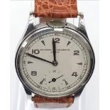 A rare Vintage Vacheron and Constantin Gents Watch, crown at number 12. Brown leather strap.