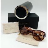 A pair of Bulgari Ladies Sunglasses with Bulgari Pouch and Carry Case. Good condition. Ref: 12683